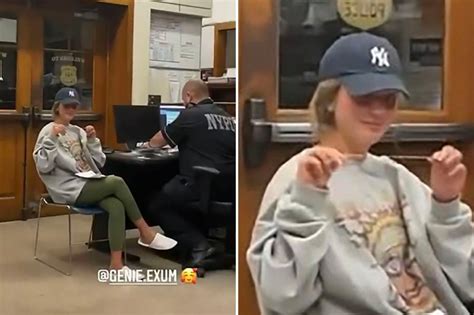 Instagram model Genie Exum smirks during police questioning